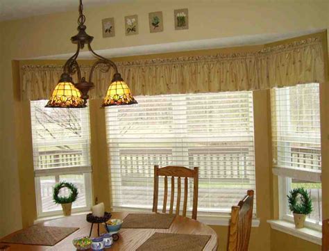 Hunter douglas window treatments, including sheers and shadings, honeycomb shades, shutters, horizontal blinds, vertical blinds, roman shades, roller shades, and woven wood shades. Kitchen Bay Window Treatment Ideas - Decor IdeasDecor Ideas