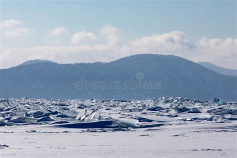 Frozen Snow Dusted Lake Baikal In Winter Khuzhir Island In Foreground