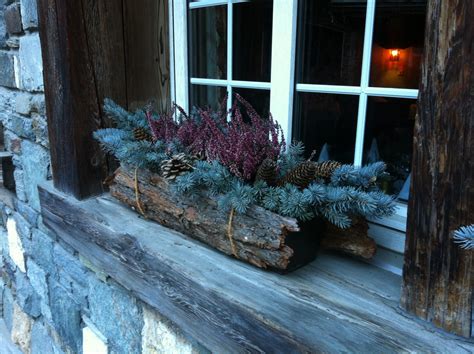 Decking out your house with christmas decorations that set the mood. Christmas Window Boxes as a DIY Winter Decoration