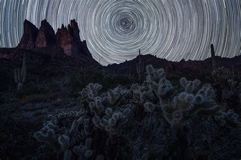 The Night Sky Over Arizonas Superstition Mountains Taken By Using A