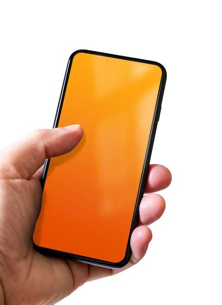 Premium Photo Hand Holding A Smartphone With Blank Orange Screen