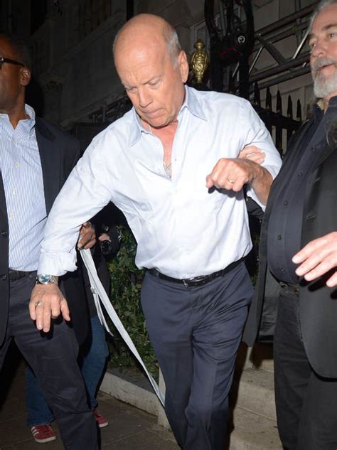 Bruce Willis Pictures Die Hard Star Looks Worse For Wear As He Leaves London Club Celebrity