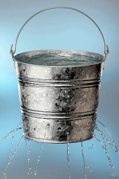 Leaking Bucket Stock Photos Pictures And Royalty Free Images Istock