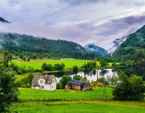Typical Countryside Norwegian Landscape With Houses On The Shore Stock