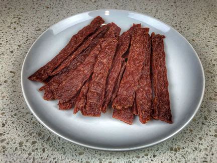 This ground beef jerky recipe is much more inexpensive than the kind from the store and can be made with all of your favorite flavors and none of the hard to pronounce ingredients! Easy Beef Jerky Recipe - Ground Beef Jerky