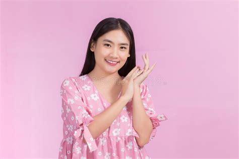 Portrait Asian Beautiful Woman In Pink Dress And Black Long Hair Her Hands Touch Cheek Smile