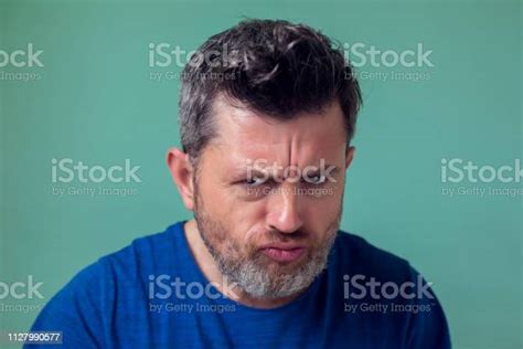 People And Emotions Angry Man With Beard Stock Photo Download Image