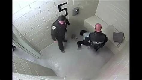 Watch Horrific Moment Cop Shoves Women Face First Into Concrete Cell Leaving Her Needing