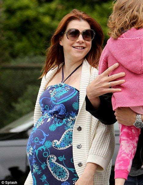 Devoted Mother Alyson Cant Take Her Eyes Off Her Mini Me Almost There Alyson Hannigan