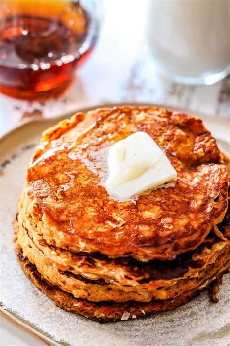 Top View Of A Stack Of Leftover Sweet Potato Pancakes With A Slab Of