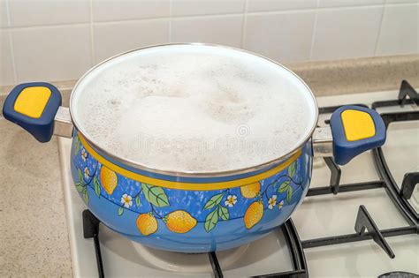 Boiling Water In Pan Stock Photo Image Of Liquid Orange 91249976