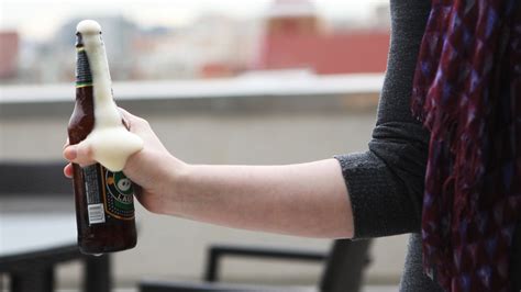Beer Tapping Physics Why A Hit To A Bottle Makes A Foam Volcano