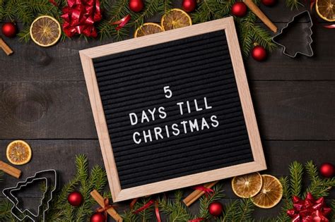 5 Days Till Christmas Countdown Letter Board On Wood Background