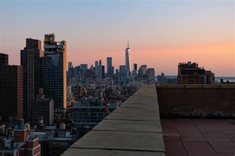 A View Of The New York City Skyline From A Building S Rooftop Stock