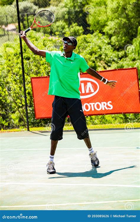 Amateur Black African Male Tennis Player Practicing On A Sunny Day