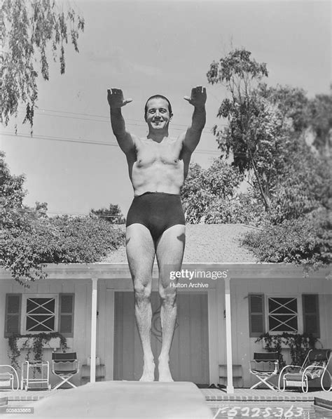 Portrait Of Actor John Payne Wearing A Pair Of Small Swimming Shorts