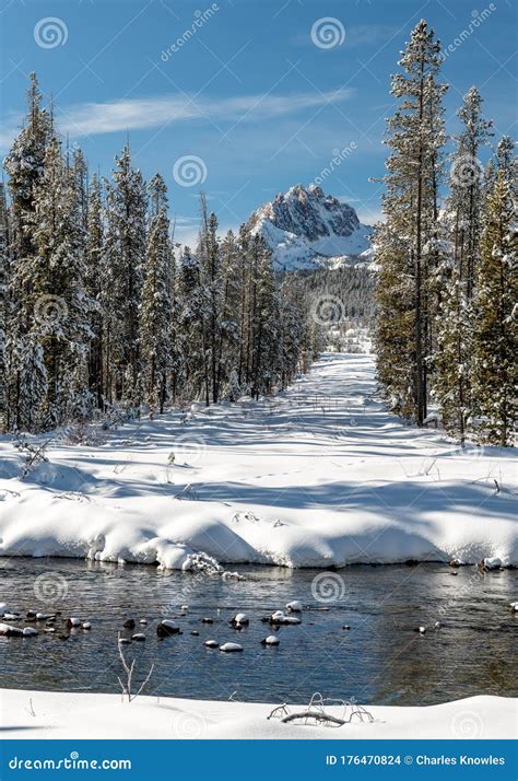 Snow Covered Road In The Idaho Sawtooth Mountains Winter Stock Photo