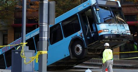 Sinkhole Opens Swallows Part Of City Bus During Rush Hour