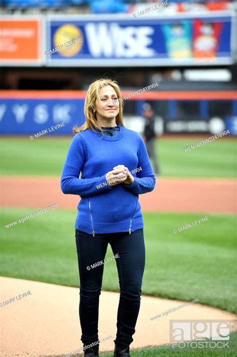 Edie Falco Throws Out The First Pitch At The New York Mets Game At Citi Field In New York City