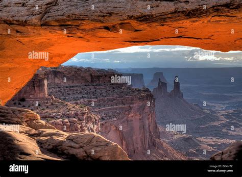 Washer Woman Arch And Monster Tower As Seen Through Mesa Arch In
