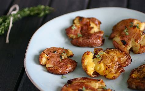 There's no denying the simple universal appeal of the potato! Roasted Smashed Potatoes - Deliciously Declassified