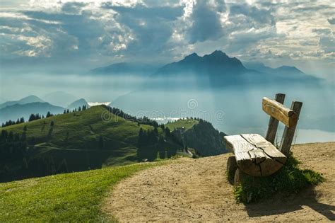 Bench With Beautiful Views On Lake Lucerne And Surrounding Steep Stock