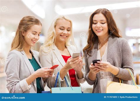 Happy Women With Smartphones And Shopping Bags Stock Image Image Of