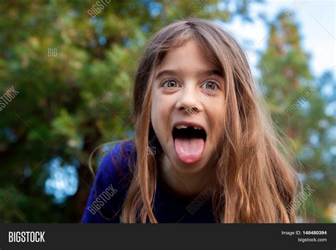 Young Girl Makes Funny Image And Photo Free Trial Bigstock