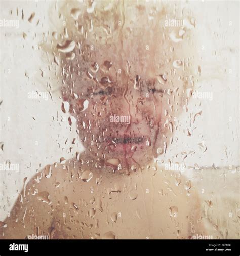 Portrait Of A Boy Standing In The Shower Crying Stock Photo Alamy