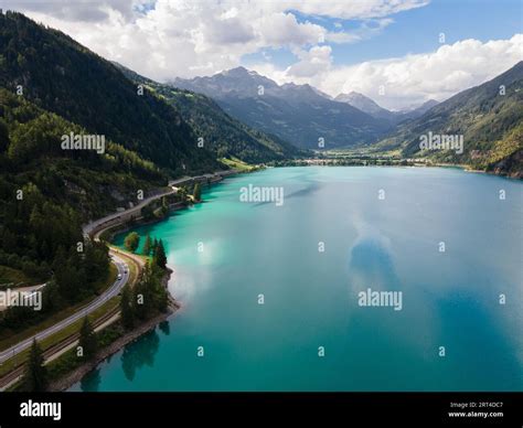 Aerial Drone View Of Poschiavo Alpine Lake And Road In The Switzerland