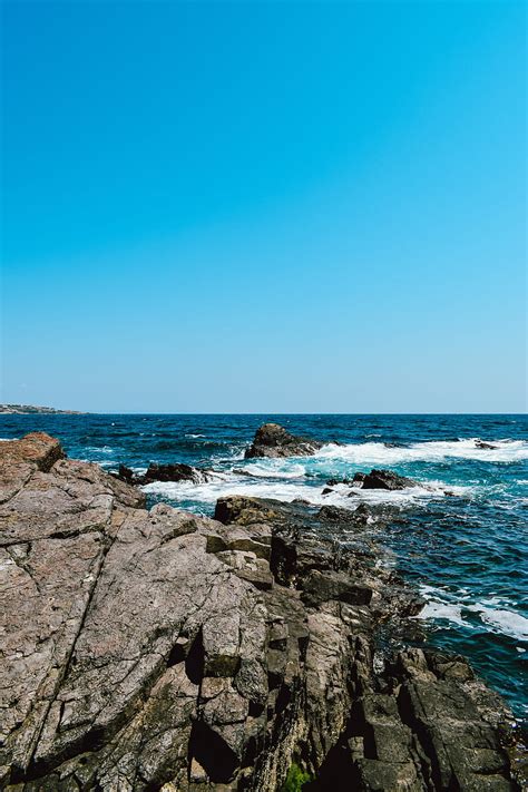 Rocks Coast Stones Sea Waves Wavy Hd Phone Wallpaper Peakpx