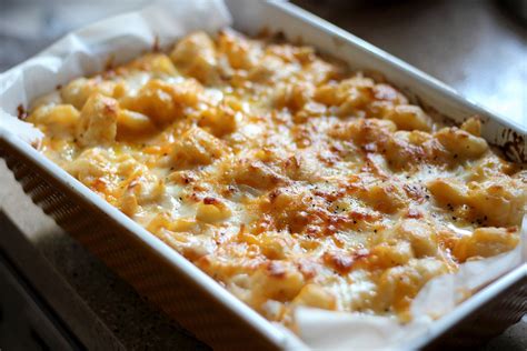 Combine the cooked macaroni, the shredded sharp cheddar cheese and the velveeta cubes in a large mixing bowl. This African's Baked Mac N Cheese | Recipe | Baked mac, Baked mac n cheese, Mac n cheese