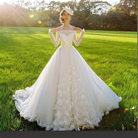 Once thought of as the staple for traditional gowns, wedding dresses with sleeves have grown to become one of the most popular options. 2016 Wedding Dresses Off The Shoulder Long Sleeve Real ...