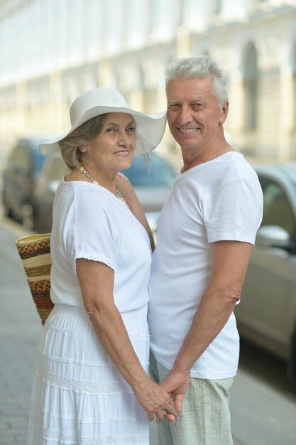 premium photo portrait of a nice mature couple in town