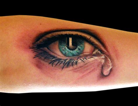The Crying Eye Art In Motion Tattoo Studio
