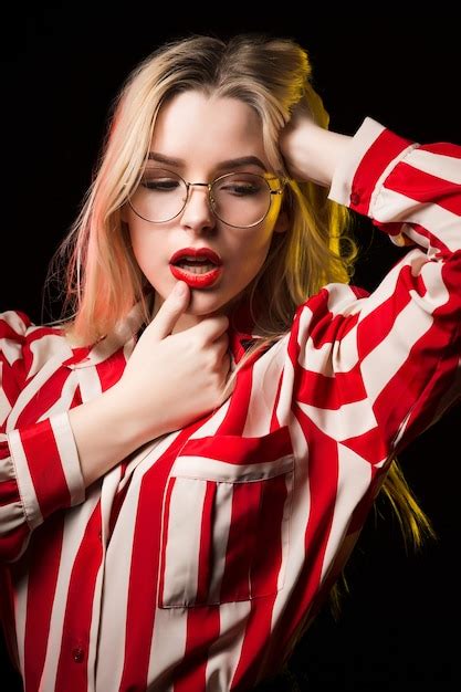 premium photo closeup portrait of fabulous blonde model with red lips wearing glasses posing