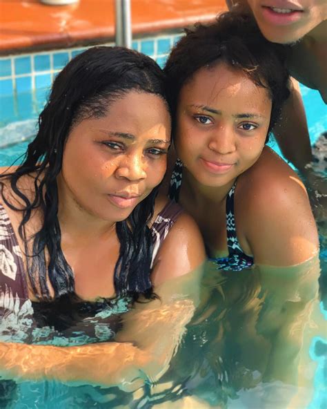 Regina Daniels And Her Mother Rita Daniels Swimming In A Pool Photo