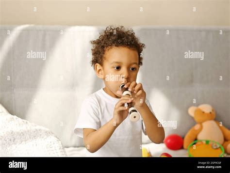 Little Boy Playing On Recorder Stock Photo Alamy