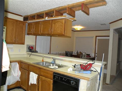 With rubbing alcohol if possible, and let it dry. Removing Cabinets & a Wall - House of Hepworths