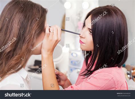 Professional Makeup Artist Doing Glamour Model Stock Photo 566568028