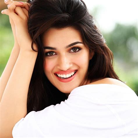 Kriti Sanon In White Shirt And With A Smile On Her Face Wallpaper Download 2524x2524
