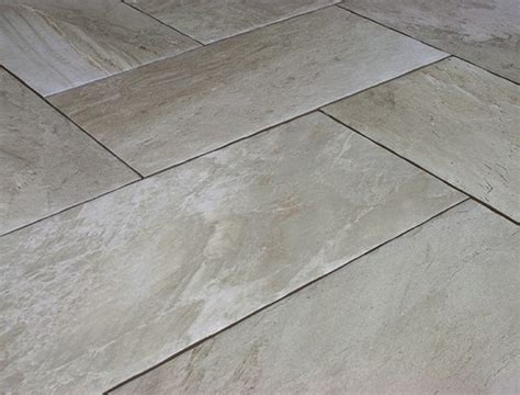 Diagonal tile patterns make a durable design statement and create the illusion of space. 12x24 tile pattern/design