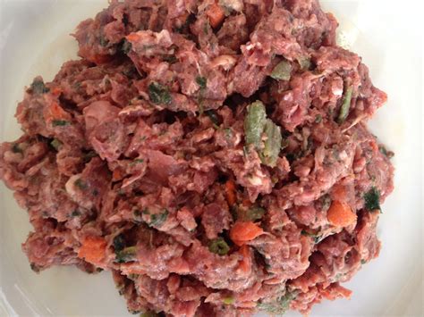 Adding fresh food to processed dog food can be accomplished daily or less frequently if desired. How to Make a Raw Diet For Dogs - Dogs First