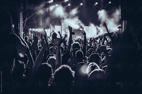concert crowd at live music festival by stocksy contributor robert kohlhuber stocksy