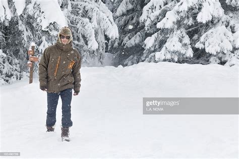 Young Man Walking In Snow High Res Stock Photo Getty Images