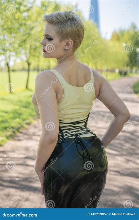Hot Curvy Woman With Short Hair And Big Boobs Wearing Latex Kinky