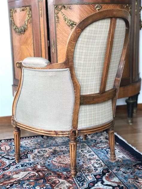 It is a comfortable and elegant armchair with leather upholstery, ivory finish in shades of beige, stitched in. Elegant Pair of Antique French Armchairs in Beige Linen ...