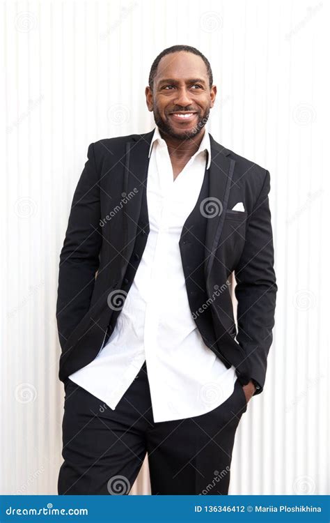 Handsome Cheerful African American Business Man In Classy Black Suit