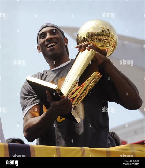 Kobe Bryant Holds The Championship Trophy As The 2009 Nba Champion