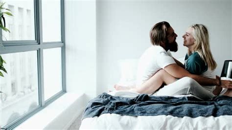 Couple Kissing On Bed In Bedroom K Stock Footage Videohive